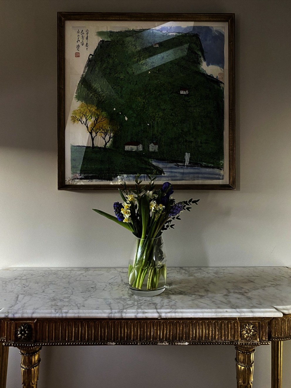 Traveller's London apartment | Detail - desk and clients artwork | Interior Designers